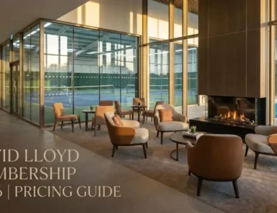 David Lloyd club exterior, indoor tennis courts, David Lloyd swimming pool, luxury gym lounge, David Lloyd spa facilities, membership price list 2026, gym cafe area.