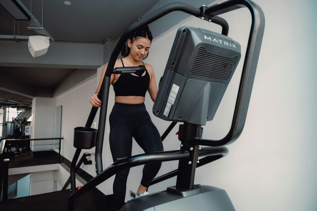 A woman on a treadmill in a gym